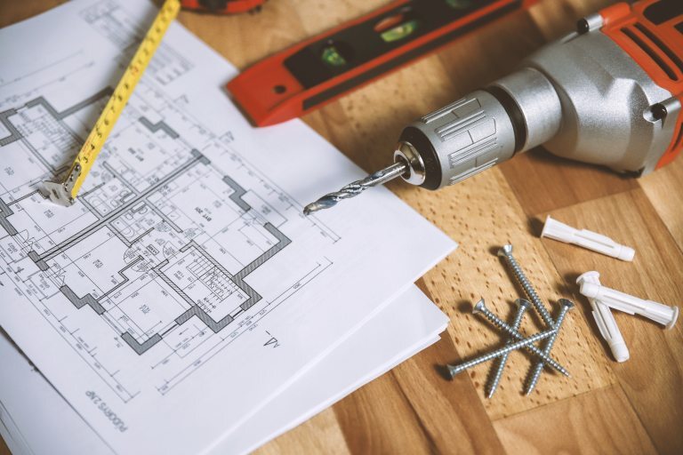 stock photo of carpentry tools and blueprints